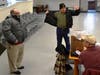 (L to R) Veterans L. Collins,  W. Hocking, P. Martinello try on their new, so very warm jackets!