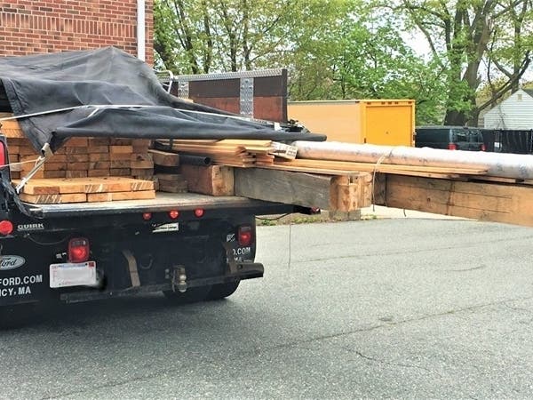 An 8-foot pole was driven up I-93 in Quincy during rush hour.