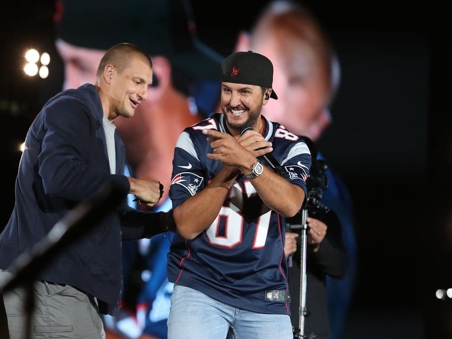 Rob Gronkowski caught a pass from Luke Bryan at the country star's "Sunset Repeat Tour" stop at Gillette Stadium Friday.