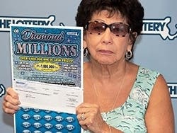 Mary Dunn won $1 million in the Mass Lottery's "Diamond Millions" $30 instant game on Aug. 3.