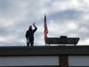 Dawe Elementary School Principal Robert Cancellieri played "Simon says" with students from the roof on Oct. 18.