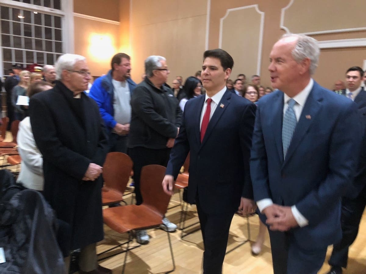 Former Mayor Joseph Sullivan, who retired after 12 years at the helm, administered the swearing-in ceremony at Town Hall Thursday for Charles Kokoros.