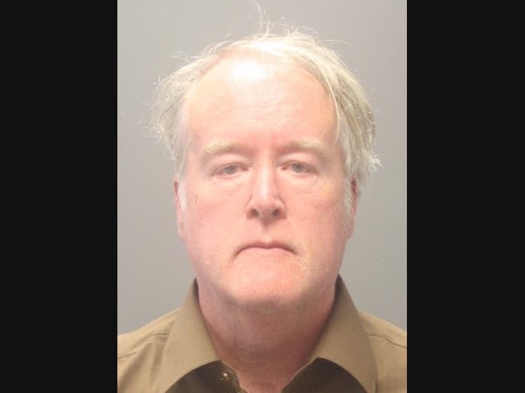 Robert Bonang dressed as a UPS delivery driver and had a box containing a rifle, prosecutors said.