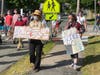Stoughton residents march in a Juneteenth rally to remember Black history and protest systemic racism.