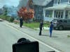 Fire Chief Michael Laracy said the three-alarm fire started on the front porch of the School Street home and spread all the way to the basement.