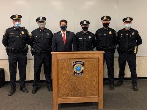 From left: Deputy Chief Michael Want, Officer Kevin St. Ives, Mayor Charles C. Kokoros, Officer Christopher Dominguez, Chief Mark Dubois and Deputy Chief Tim Cohoon at the Braintree Police station on Monday, Feb. 1. 
