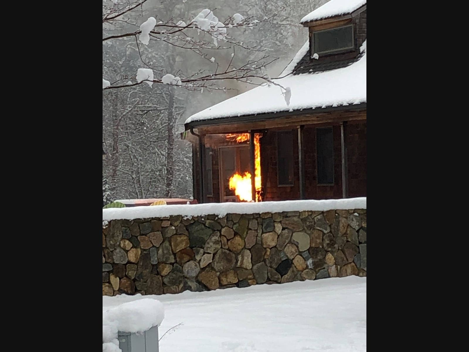 Fire officials were called to the home around 4:20 p.m. and found a natural gas fueled fire engulfed the outside of the building in flames. 