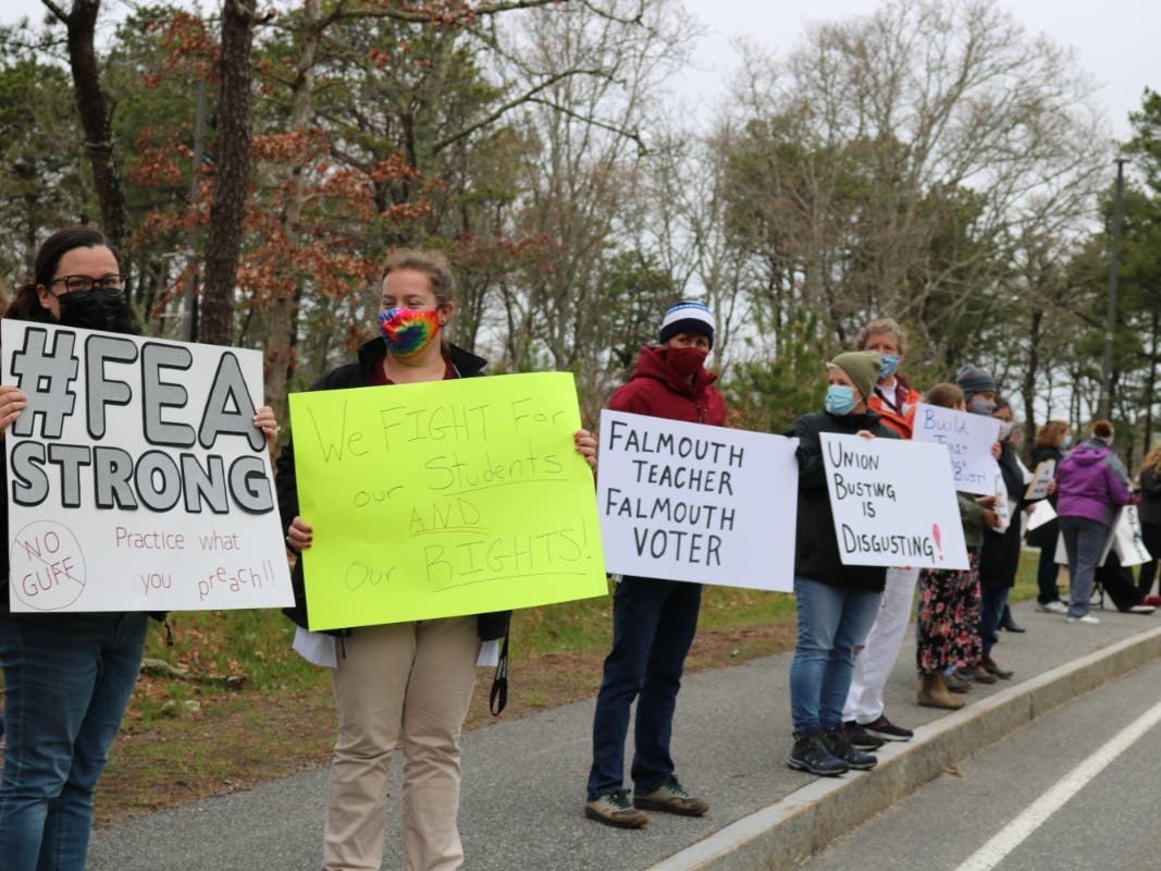  Teachers gathered at Falmouth High School Tuesday with signs reading "FEA strong" and 'Union busting is disgusting," to show support for Falmouth Education Association President Lori Andrade.
