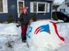 Katina Gustafson, an art teacher at Riverside Middle School in East Providence, paid tribute to quarterback Tom Brady's legendary career by making a snow sculpture of his New England Patriots helmet. Gustafson used snow from last weekend's blizzard.