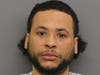 East Providence Police Chief Christopher Francesconi said Joseph Darosa,​ 28, of Modesto, California, was caught with a suitcase containing 14 guns, four of which were stolen out of Texas, and one with an obliterated serial number.