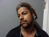 Kotey Gibson, 27, of Burton, Michigan, and Patrick Richardson, 38, of Brooklyn, New York, were charged with possession of a firearm by a person convicted of a crime of violence, possession of a stolen vehicle, and more.