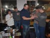 Former New England Patriots guard Joe Andruzzi lets fans try on his Super Bowl rings at his cancer charity event on March 31 at Audrey's Coffee House & Lounge in South Kingstown.
