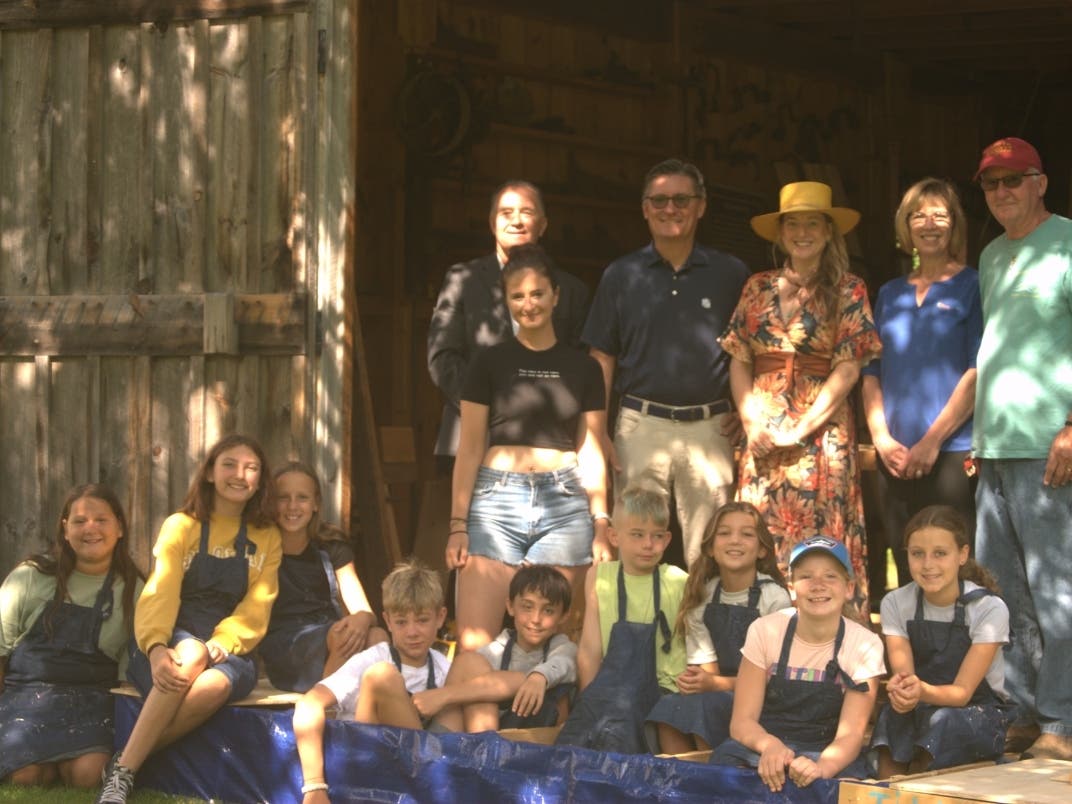 BankNewport's grant allowed the museum to host four camp field trips from June through August, during which campers worked with carpenter Steve Black in the museum's woodworking shop to construct wooden dragon boats and paddles for racing.