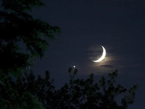 Bright Venus and a crescent moon are shown in this NASA file photo. As morning approaches on Nov. 9, the planet of love will appear to be less than a degree to the right of the moon's upper tip and appear to “kiss” it.
