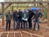 One of the many projects the volunteers took on was to build a new pavilion to provide shade at one of Camp Kettleford's campsites.