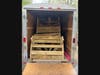 Benches are loaded up to be taken to other camp properties run by Girl Scouts of the Green and White Mountains.