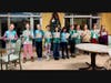 In Windham, NH, Troop 62087 visited the seniors at Warde Senior Living, helping them make crafts, distributing cards, and singing Christmas carols together. 
