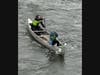 A pair of racers in the General Clinton Regatta battle the wind, rain and current.