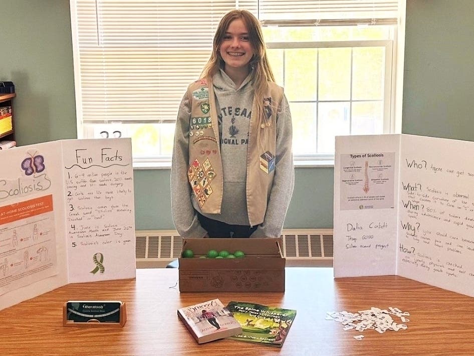 Dalia Corbett made a presentation to a middle school health class about scoliosis to educate them on the condition and encourage them to be tested as part of her Girl Scout Silver Award work.