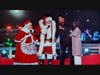 Santa and Mrs. Claus appearing with the local CBS affiliate hosts.