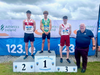 Here, Ciarán Brosnan receives his first national title at the Irish U17 Track and Field National Championships.
