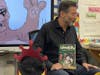 Barry Farber reads from The Adventures of Little Billy: In Search of the Magic Tree during a classroom visit with elementary students.