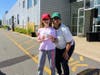 Southborough’s Nicole Lefavour receiving a Christian Vazquez autographed baseball from Raquel Morales of The Jimmy Fund.