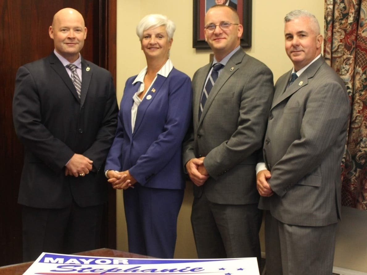 Teamsters Local 25 President Sean M. O’Brien; Medford Mayor Stephanie Muccini Burke; Teamsters Local 25 Secretary-Treasurer Thomas G. Mari; Teamsters Local 25 Vice President/Business Agent Steven J. South of Medford.