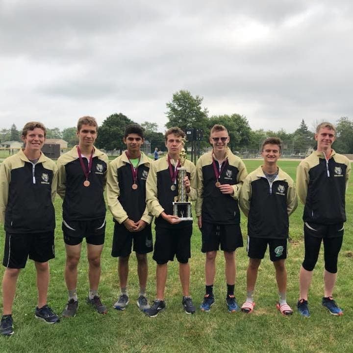 OFHS Cross Country Team celebrates their win.