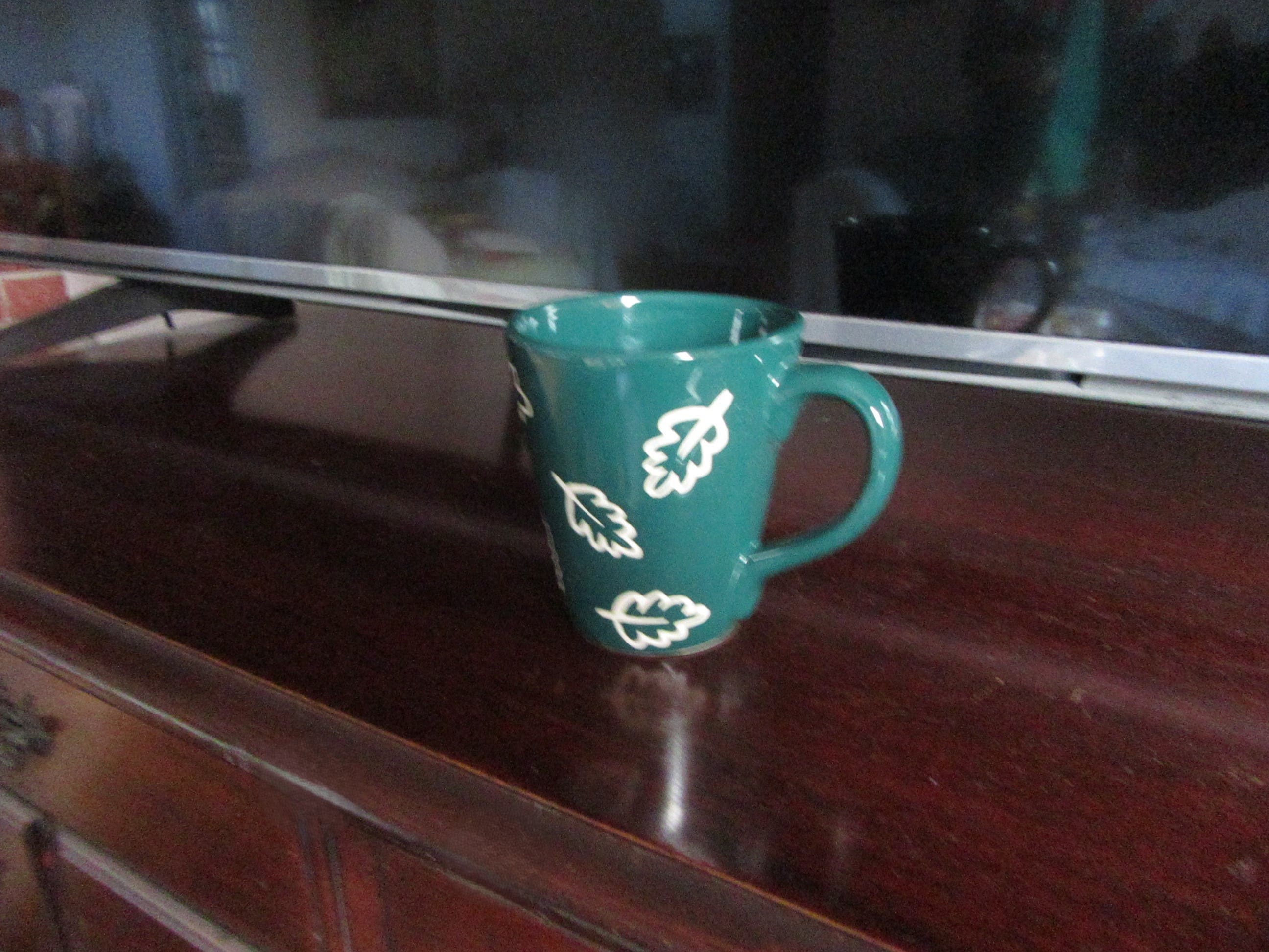 (8) green mugs