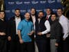 Individual honoree Nigel Archibald, second left, and members of the 2005 baseball team (team honoree)