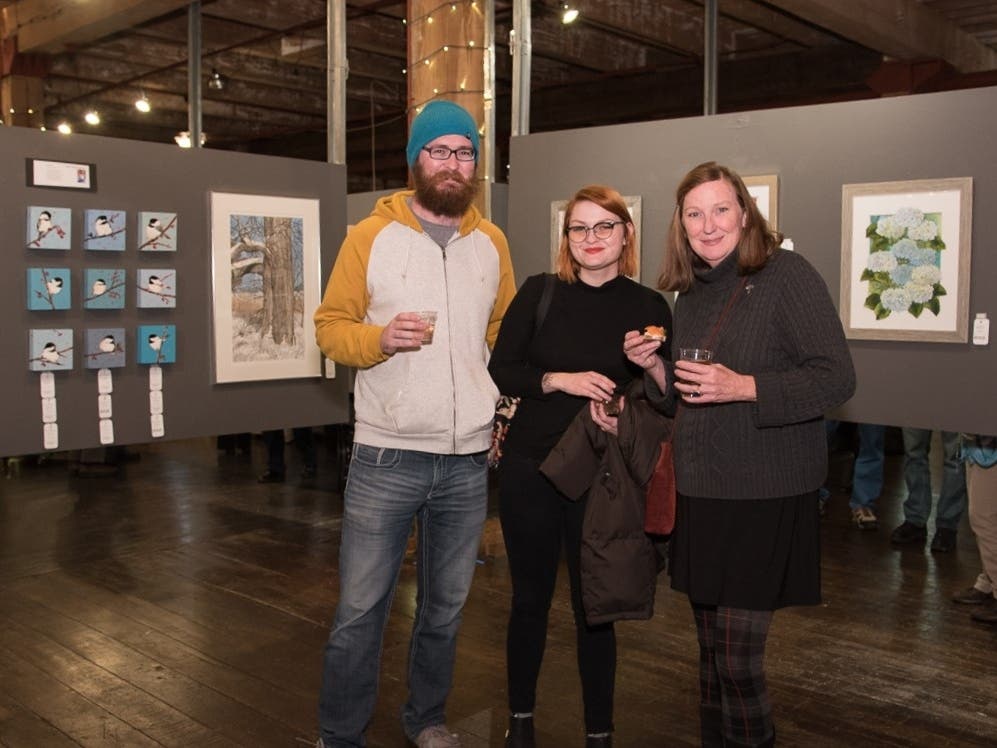 Attendees experience art inspired by the local landscape at the Art of the Land art show and fundraiser. Proceeds from the event support land preservation in McHenry County.