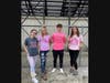 The Busy B team displays their designs for breast cancer awareness month. This DECA school-run business is the second business that won a School-Based Enterprise Award recently.
