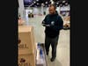 A senior member assisting the Massachusetts Emergency Management Agency sorting and distributing Covid-19 supplies at the start of the pandemic.