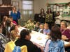 Sarah Neuman resident Maggie tells a story of friendship to the Girl Scouts