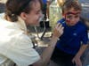 Free face painting by art student and scholarship winner Megan Leavitt.