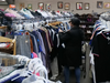 Local shopper searching through the fashion items to expand her wardrobe.