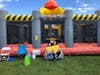 Emily DeMaio and Nola Hallemeier supervise the Wrecking Ball inflatable at Septemberfest