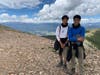 Philmont High Adventure. Left to right: Sunay Bhatt and Samay Bhatt on top of Mount Baldy in New Mexico on July 6, 2022