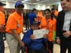 Rotary District Governor 5170 and his wife, Sobha, presenting a Wheelchair as a donation in Mexico