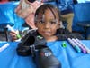 A Wesley Elementary student decorates brand new shoes courtesy of CIS of Houston, Soles4Souls and Skechers