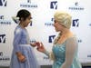 Elsa leads families on tour of YES Prep's new elementary classroom