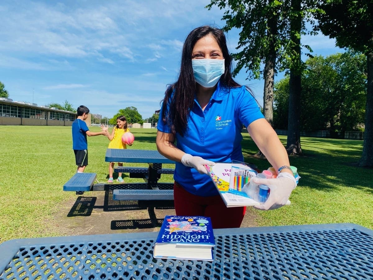 Communities In Schools of Houston Student Support Specialist Nelda Zuniga is normally embedded at Spring Branch Middle School. Since schools closed, Zuniga and her CIS colleagues are working remotely to meet students' and families' record needs.