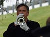 Glenn Maravetz plays taps in honor of the Centerville Six