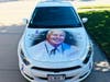 The image of Pat's husband, Marlyn Washburn, graces the hood of the “Marlyn Mobile;” Marlyn lost his battle with breast cancer in 2017 at the age of 66.