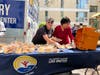 Volunteers distributing hot meals at Countryside Village, Marlborough