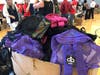 Backpacks filled with school supplies by Halliburton employees for Houston children.
