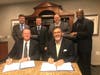 Front (L to R): Mickey Lenamon, CEO of TBM; Dr. Albert Reyes, president and CEO of Buckner International. Back (L to R): Rand Jenkins, TBM; John-Travis Smith, TBM; Dwain Carter, TBM; Henry Jackson, Buckner.