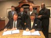 Front (L to R): Mickey Lenamon, CEO of TBM; Dr. Albert Reyes, president and CEO of Buckner International. Back (L to R): Rand Jenkins, TBM; John-Travis Smith, TBM; Dwain Carter, TBM; Henry Jackson, Buckner.