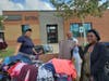 Gallery Furniture delivers 2,000 pounds of clothes to nonprofit Buckner International